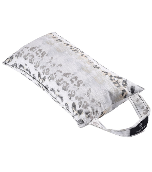 Hugger Mugger Zafu Meditation Cushion in Wild Sky pattern, designed for yoga and meditation practice. This cushion features a stylish, leopard-inspired print with a convenient carrying handle. Ideal for enhancing comfort and support during meditative sessions.