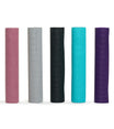 Five Everyday Yoga mats in pink, gray, black, turquoise, and purple are displayed standing upright. Each mat features a textured surface and the 