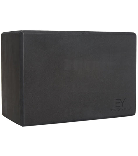 Black foam yoga block by Everyday Yoga, designed to enhance stability and support during yoga practices. Ideal for beginners and advanced practitioners, this yoga block aids in achieving proper alignment and deeper stretches. Durable and lightweight, it's a perfect addition to any yoga routine.