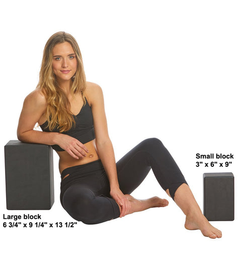 Everyday Yoga Foam Yoga Blocks in black are shown in two sizes: a large block measuring 6 3/4