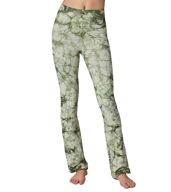 NUX Women's Straight Leg Yoga Pants in Nebula design, ideal for yoga enthusiasts seeking comfort and style. These pants feature a unique green and white pattern, perfect for enhancing flexibility and movement during workouts. Crafted with high-quality materials, they offer a blend