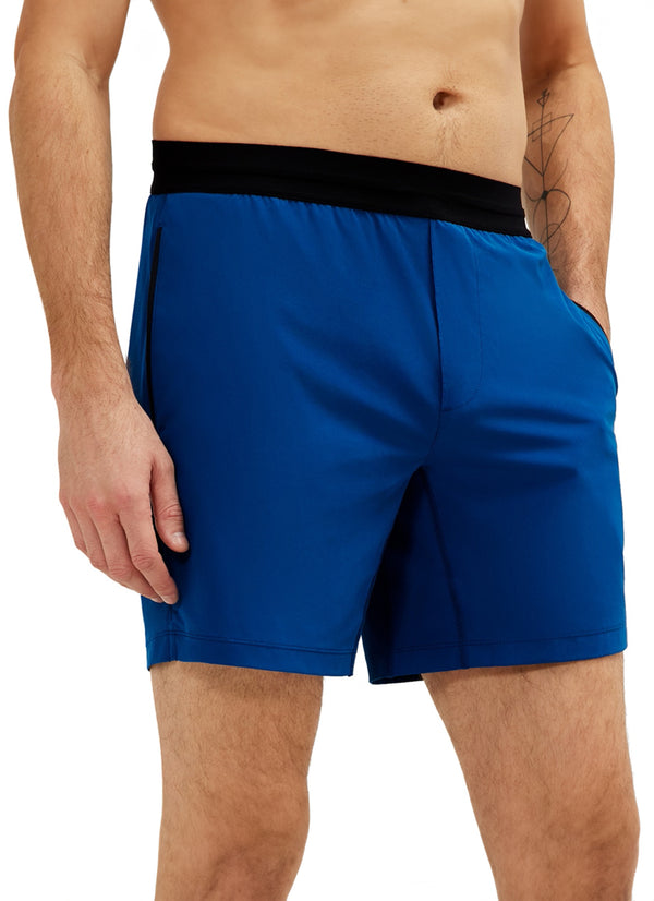 Rhone Men's Yoga Shorts in vibrant blue, designed for optimal comfort and flexibility during yoga sessions. Featuring a black waistband, these shorts are ideal for enhancing performance and style in any workout.