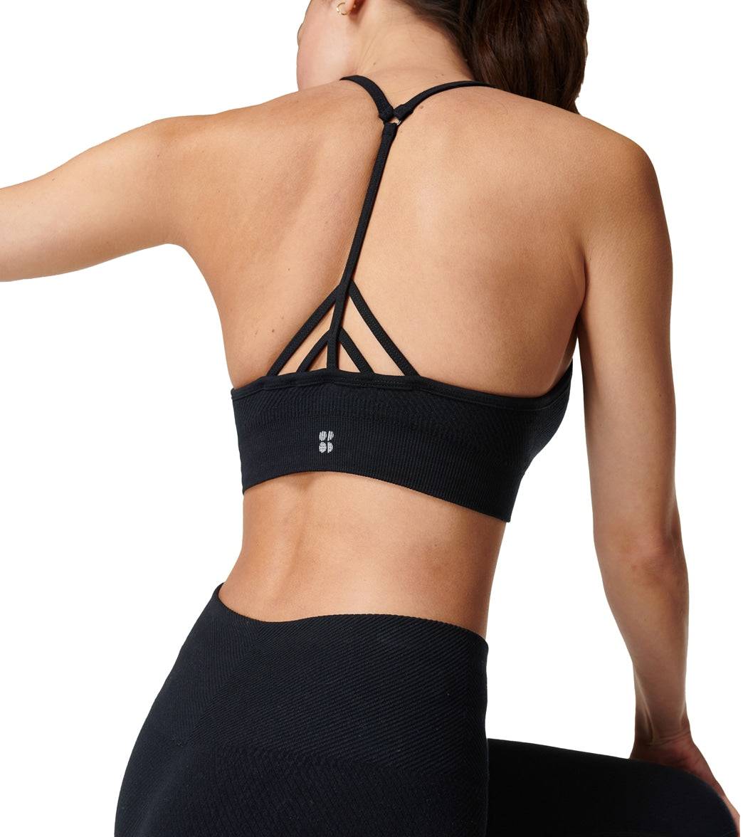 Buy Onzie women solid strappy back unpadded sports bra black